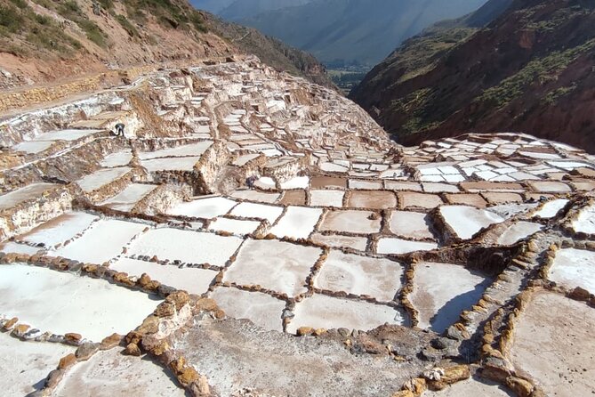 2 Days Sacred Valley Private Tour and Sunrise in Machu Picchu - Pisac combines terraces, ruins, and a local market