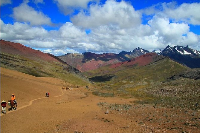 Best One-Day Rainbow Mountain & Red Valley Excursion - Rainbow Mountain’s red, gold, and turquoise bands
