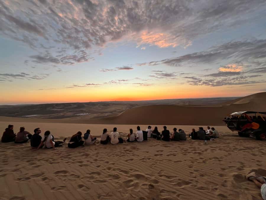 Buggy tour in the Huacachina Desert, sunset, and sandboarding - Sandboarding from three or four sandy launch points