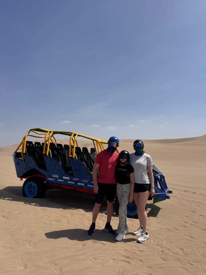 Buggy tour in the Huacachina Desert, sunset, and sandboarding - Sunset on a high dune, often with a cold beer