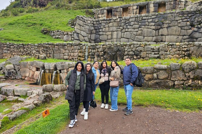 City Tour Cusco - Group - Tambomachay: water still flowing through an Inca site