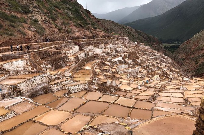 Complete Sacred Valley Tour Small group Pisac, Maras, Moray & Ollantaytambo - Maras salt pools: a bright patchwork on the mountainside