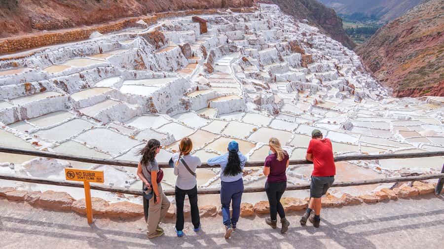Cusco: 4-Day Lares Trek to Machu Picchu with Panoramic Train - Day 1: Markets, hot springs, and the Blue Lagoon