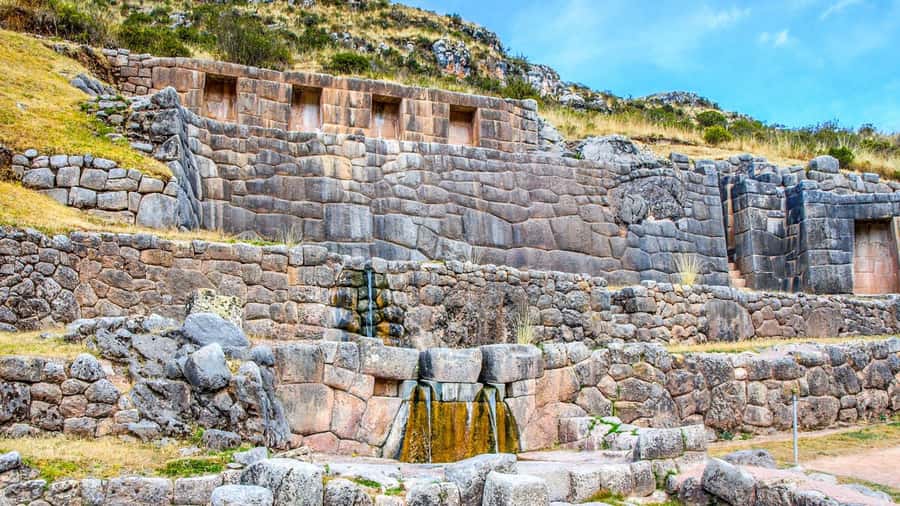 Cusco: Pisac, Sacsayhuaman, Q'enqo, and Tambomachay Tour - Sacsayhuaman shows Inca stonework at full scale