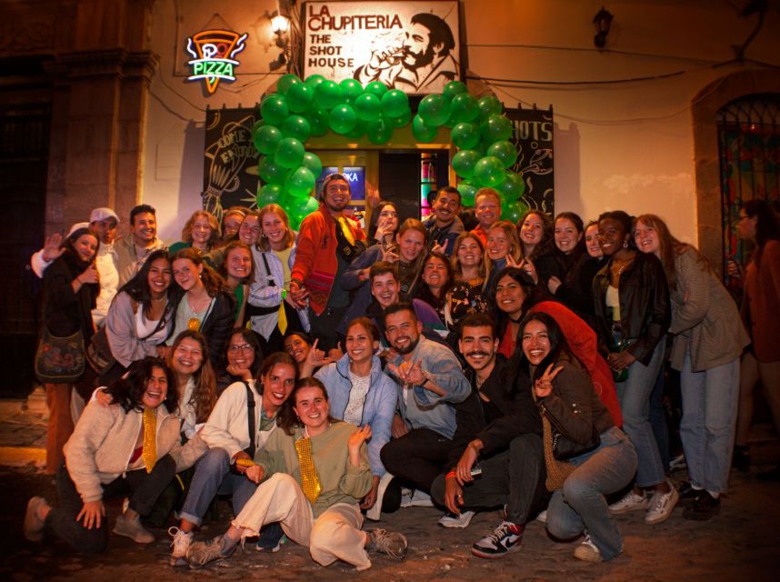 Cusco: Pub Crawl with Skip-the-Line Access and Drinks - Walking Through Cusco After Dark