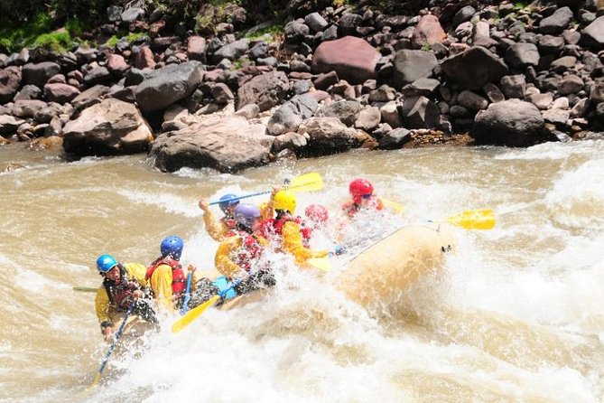 Cusco Rafting and Zipline Adventure - Getting warm at camp after the rafting