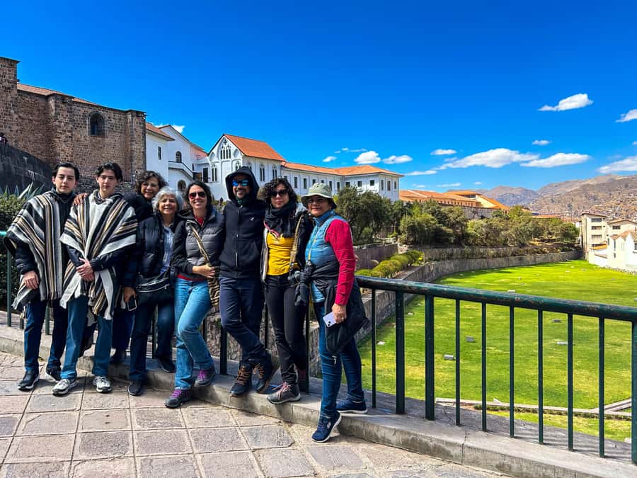 Cusco's historical tour and San Pedro Market bites - The Twelve-Sided Stone and close-up Inca craft