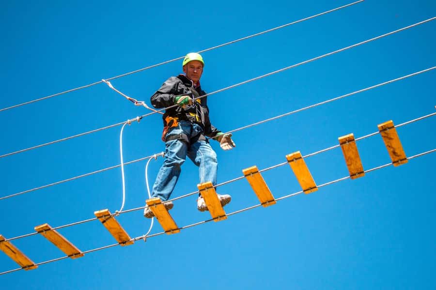 Cusco: Zipline in the Sacred Valley - Getting fitted with a harness, helmet, and gloves