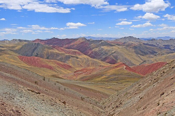 Excursion to Rainbow Mountain Palcoyo with Coca Ceremony Private - Three peaks, wide views, and Ausangate