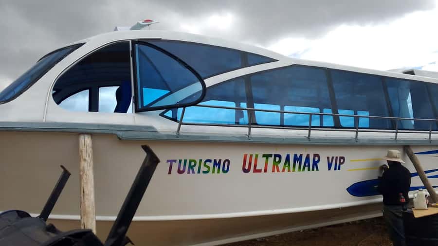 Floating Islands of Los Uros: Guided Tour, Culture and Tradition. - Entering homes and trying Uros clothing