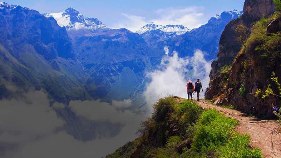 From Arequipa: Colca Canyon Day Trip with Transfer to Puno - Sunrise views across the Andes
