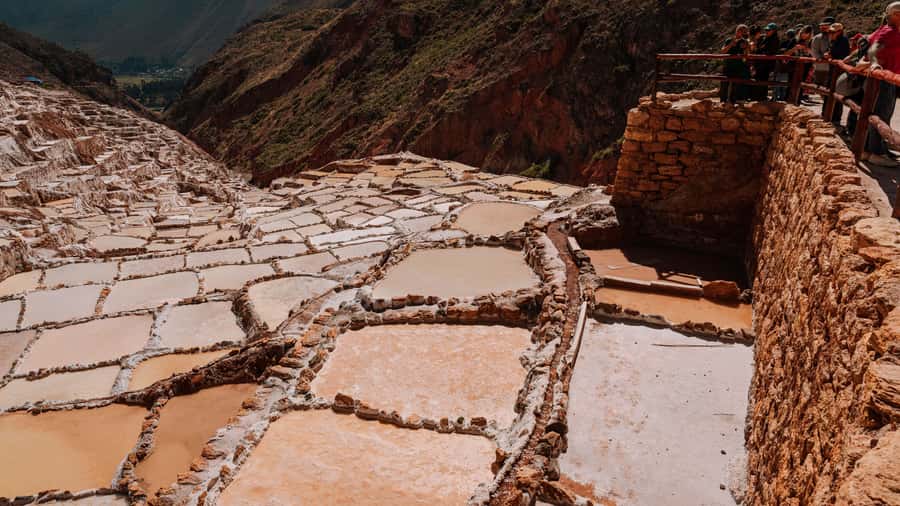 From Cusco: ATV Off-Road Tour to Moray and Maras Salt Mines - The weaving family visit adds local contact
