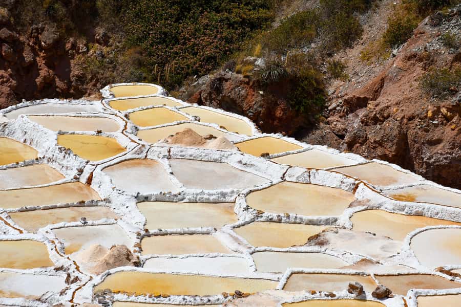 From Cusco: Chinchero Weavers, Moray, Maras Salt Mines Tour - Moray’s circular terraces and careful water control