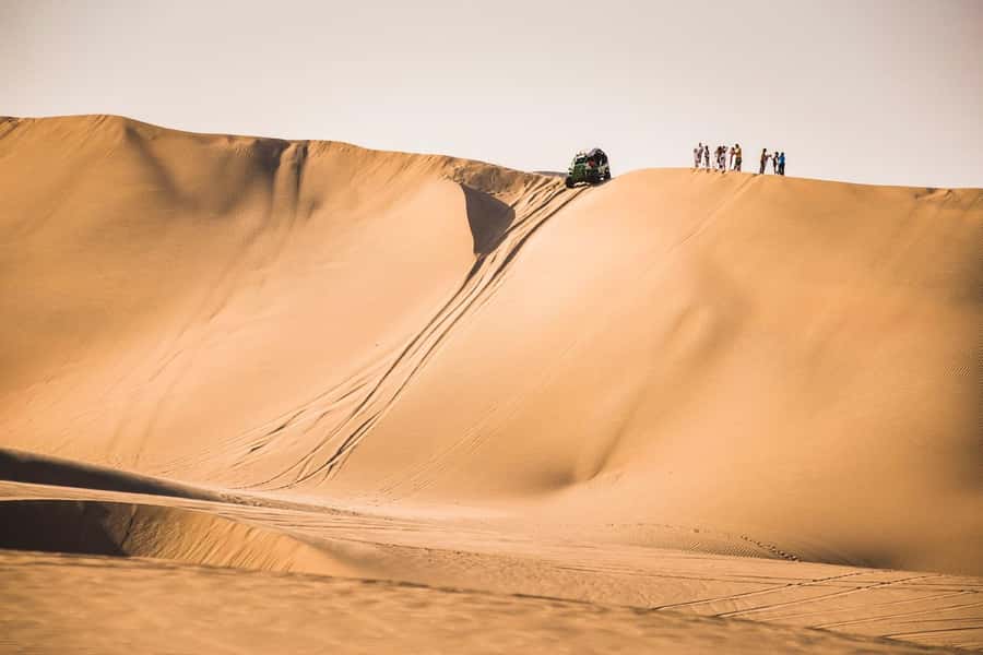 From Lima: Paracas and Huacachina Oasis Full Day Tour - Paracas free time and the extra local charge