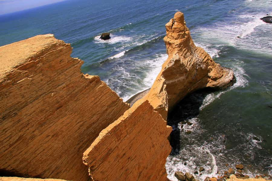 From Paracas: Ballestas Islands & Paracas National Reserve - The Candelabro, a mystery carved into the peninsula