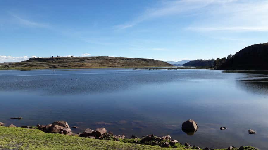 From Puno: Sillustani Tombs and Tourist View Point Puma - What the chullpas reveal about pre-Inca life