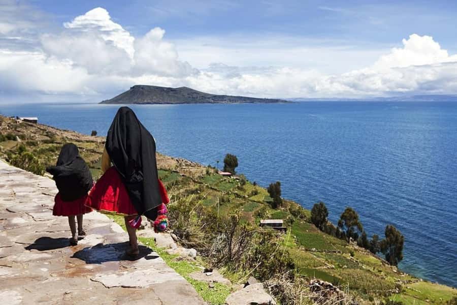 From Puno: Uros and Taquile Islands Full-Day Tour - Uros: learning how floating islands are made