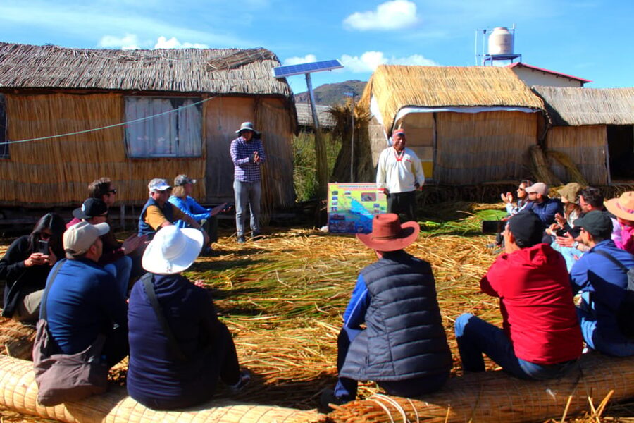 From Puno: Uros floating islands half Day tour - Taking in the lake from the floating islands
