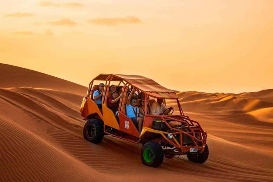 Huacachina: Sandboarding and Dune Buggy Tour + Sunset - The sunset above the oasis