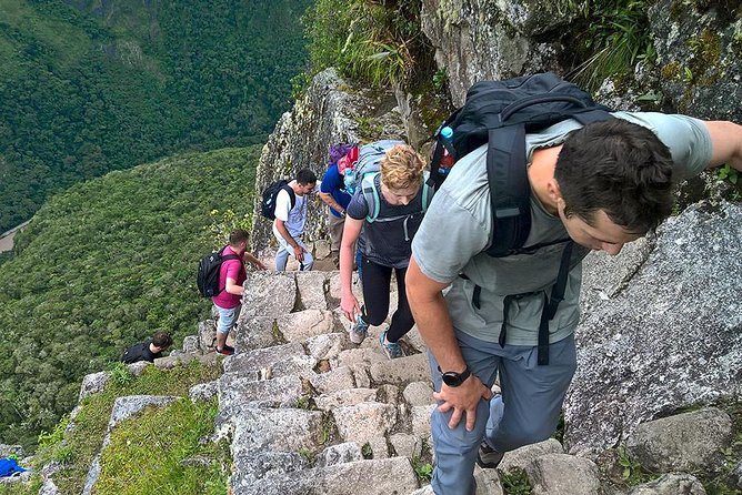 Huayna Picchu and Machu Picchu from Cusco Full day - Climbing Huayna Picchu above the ruins