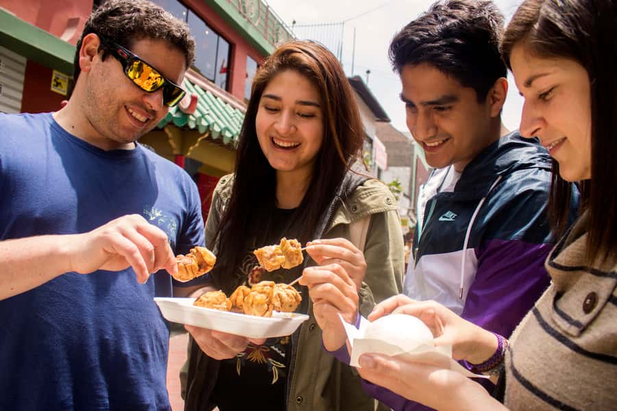 Lima: Flavors and Tradition Walking Tour with Food Tasting - San Francisco Church, churros, and Cordano Tavern