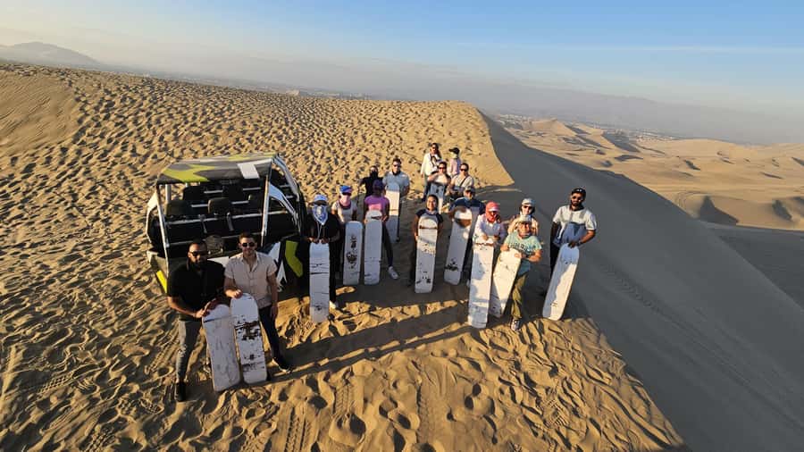 Lima: Paracas & Huacachina Oasis Day Trip with Wine & Dunes - Guides, language, and group organization