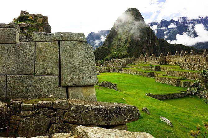 Machu Picchu Full Day Tour / Machu Picchu Day Trip - Arriving in Machu Picchu Pueblo and taking the bus uphill