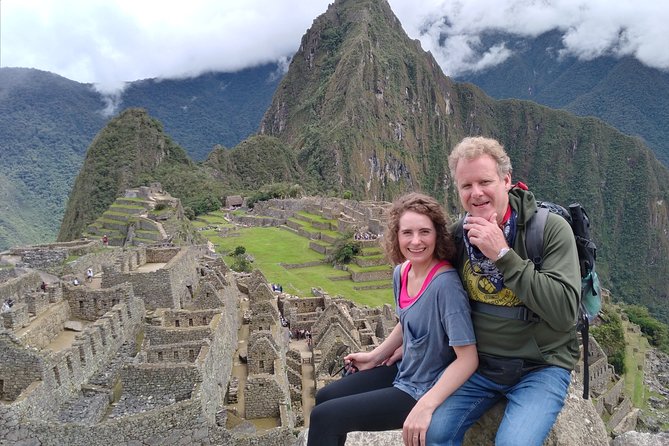 Machu Picchu Full Day Trip by Train from Cusco - Entering Machu Picchu with a guide