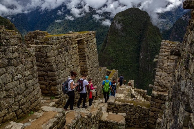 Machu Picchu Tour by Vistadome Panoramic Train from Cusco - Entering Machu Picchu under the current circuit rules