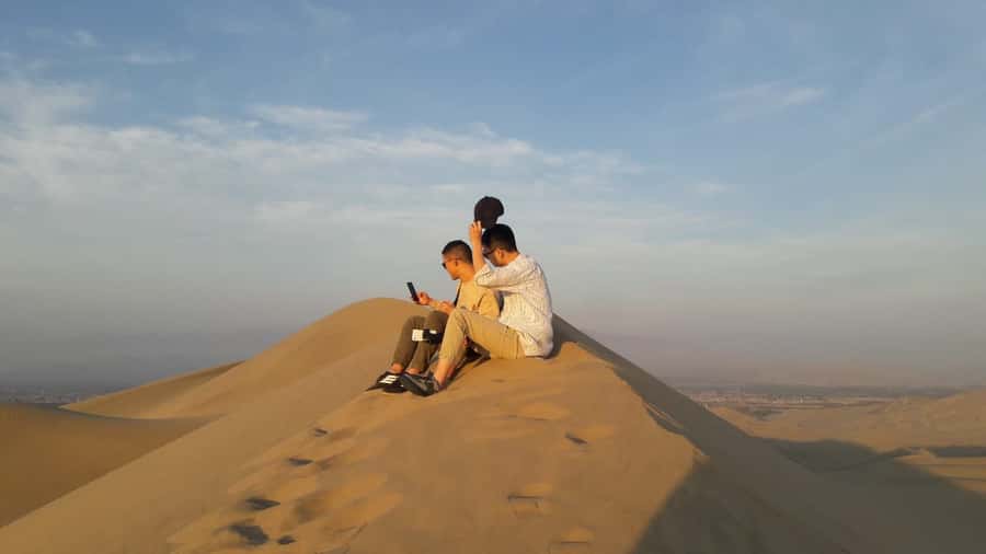 Paracas or Pisco: Private Huacachina Oasis Tour & Buggy Ride - Sandboarding on the high dunes