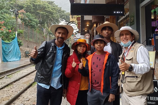Private Professional Guide in Machu Picchu from Aguas Calientes - Booking, weather, and cancellation details