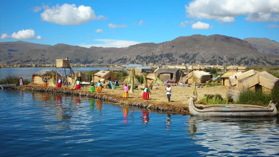 Puno: Lake Titicaca, Uros, and Taquile Full-Day Tour - Leaving Puno for the reeds of Uros